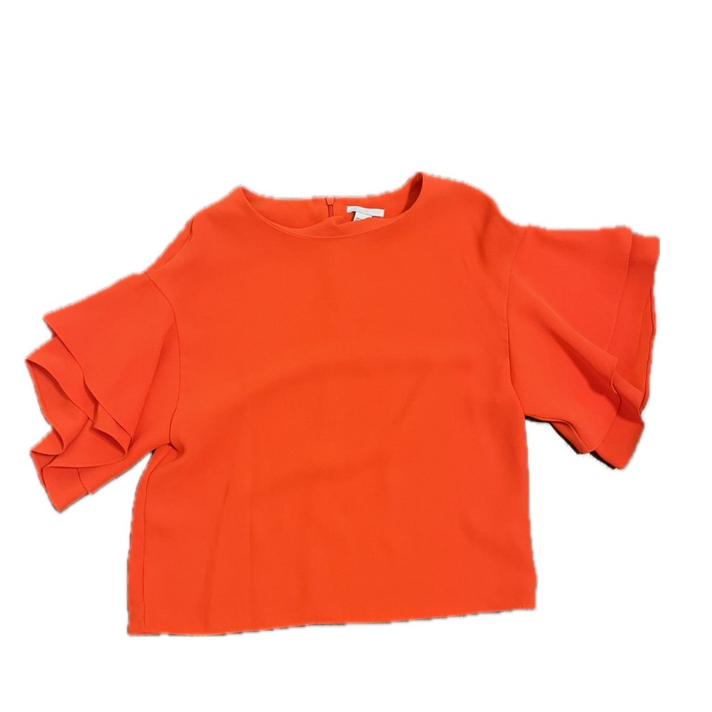Flowy orange blouse with ruffle sleeves